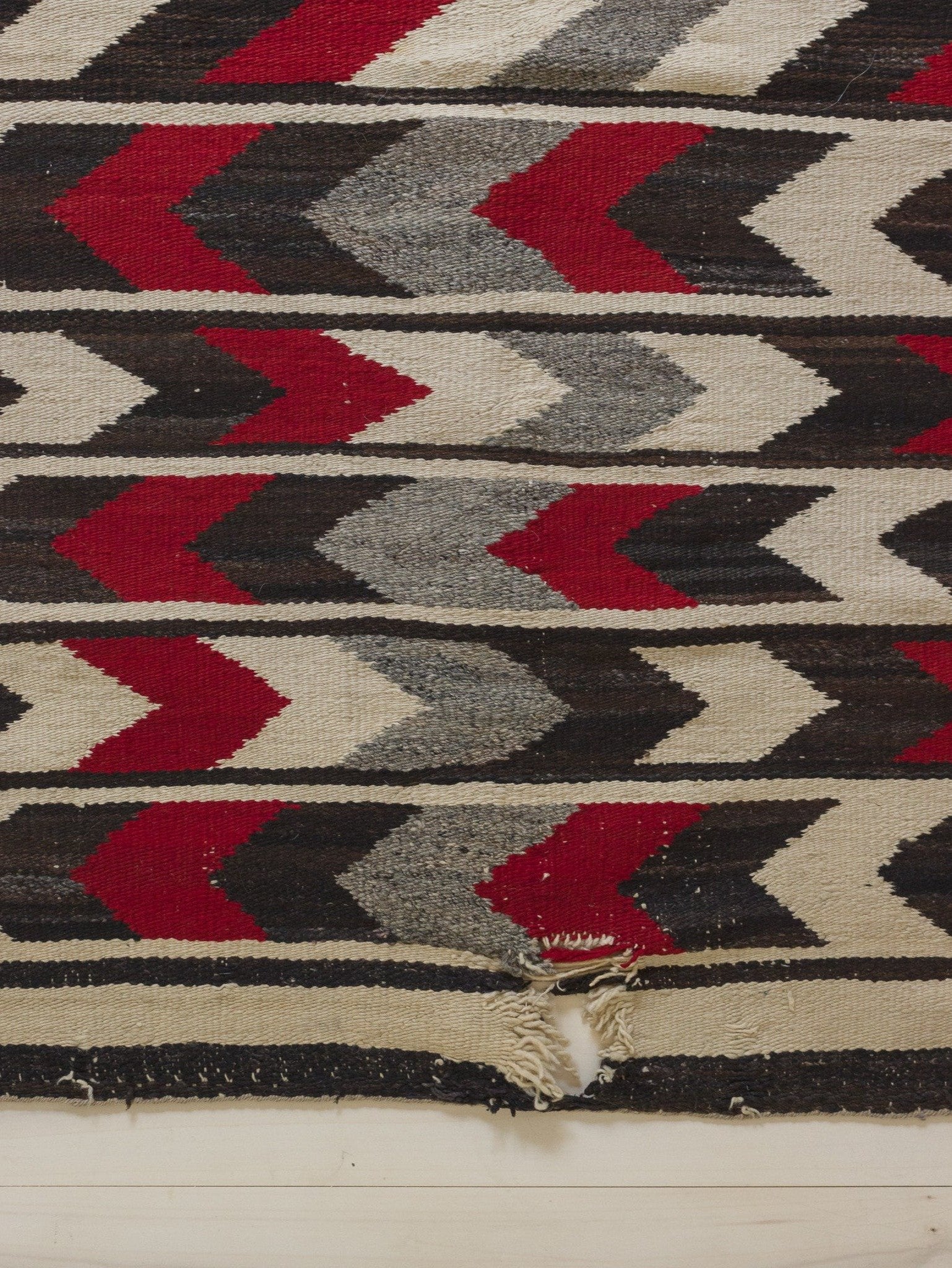 Grey, Red, White and Brown Chevron Navajo Rug